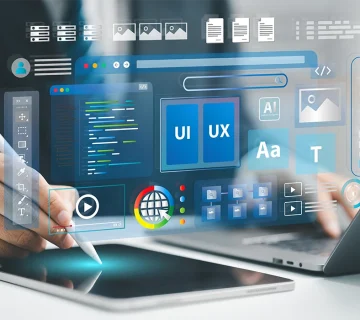 Professional web design services concept showing UIUX interface development on tablet and laptop