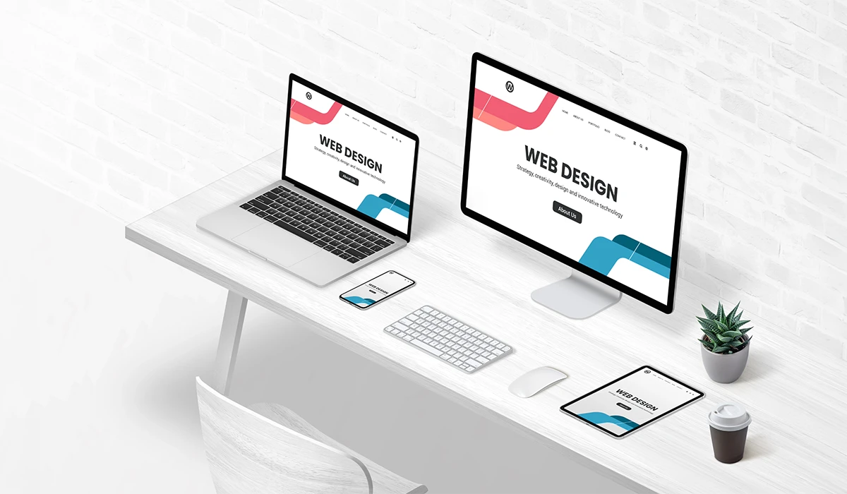 Website Development Agencies showcasing responsive web design across desktop, laptop, tablet, and mobile devices in a modern workspace 